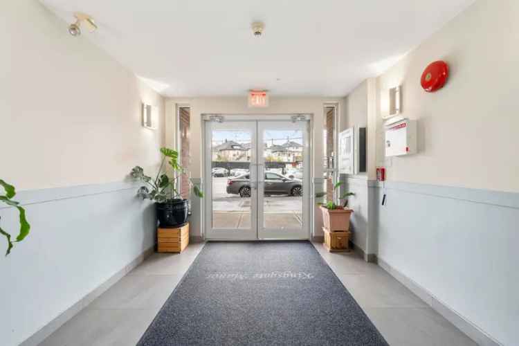 Vancouver East Condo for Sale 1 Bed Den Top Floor