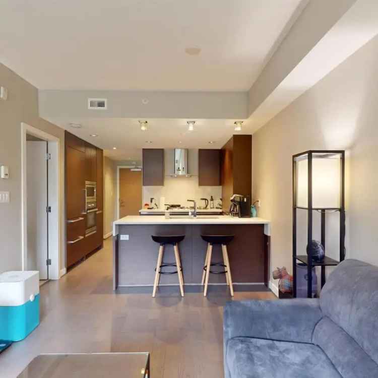 1 Bed + Den Condo at Empire at QE Park