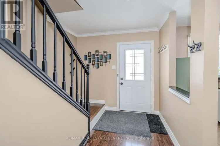 Buy End Unit Townhouse with Open Concept Kitchen in Family Friendly Community