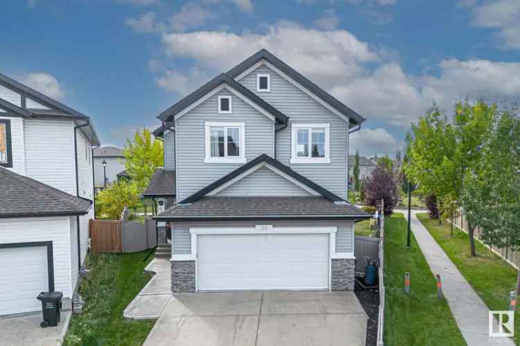 Buy Stylish 2 Storey Home in Tamarack with Greenspace Access