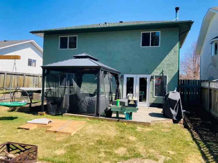 4-Floor Home with 3 Beds, 2.5 Baths, Family Room, and Large Backyard