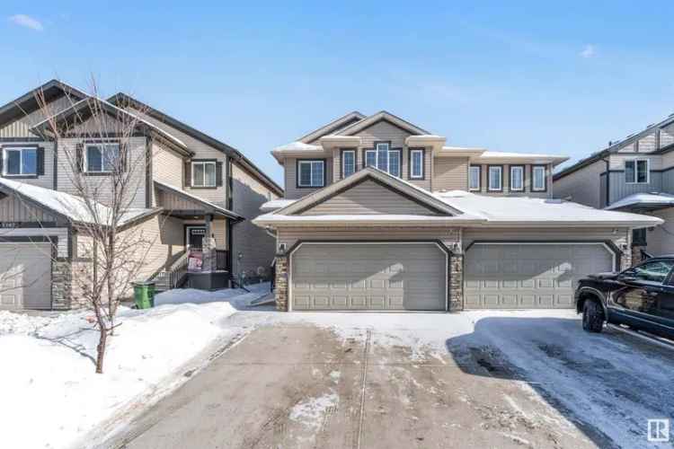 buy half duplex in south edmonton with bonus room and landscaped backyard