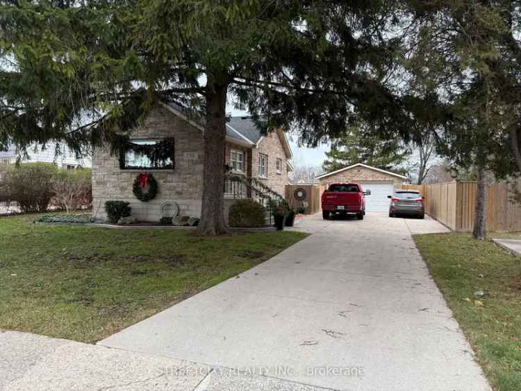 Buy Brick Bungalow in Landscaped Yard with Heated Garage