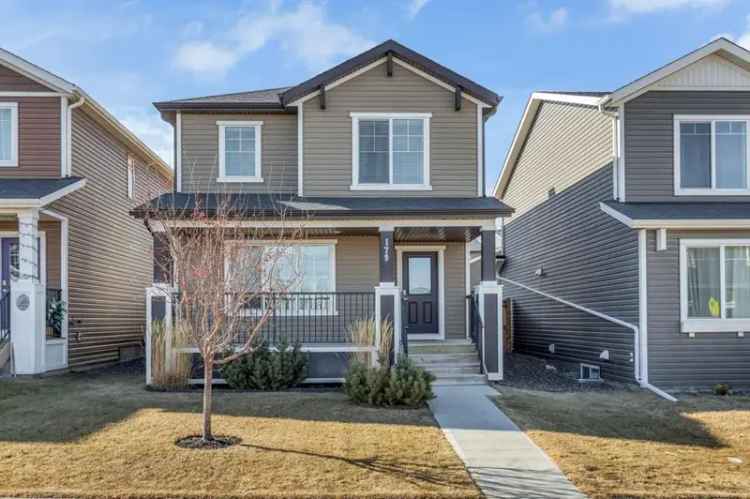 Buy Detached Residence in Cochrane with Beautiful Landscaping and A/C