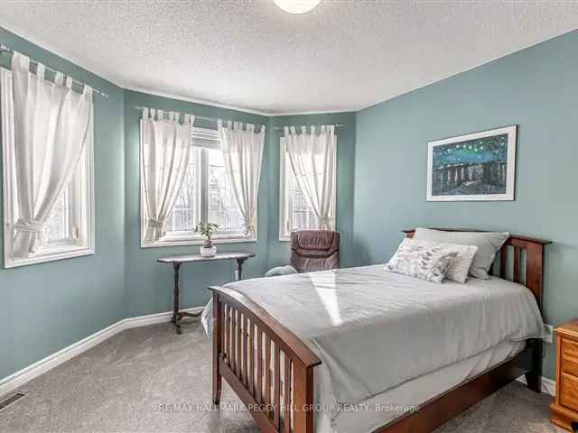 Spacious 2-Storey Home Backing Onto Ardagh Bluffs