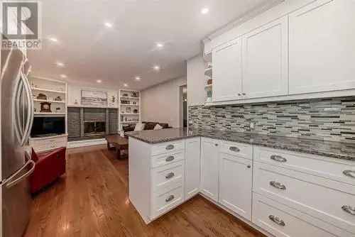 Buy House in Parkland Calgary with Renovated Features and Private Lot