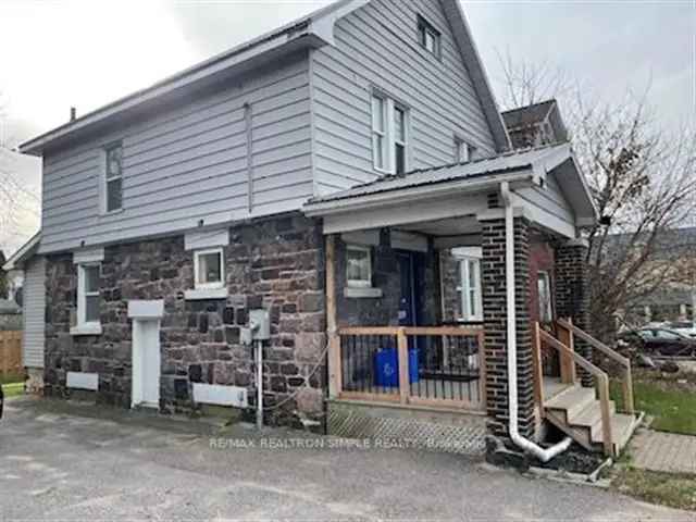 Downtown Duplex with C-2 Zoning and Income Potential