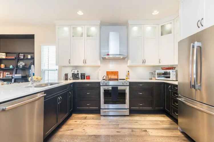 4-Bedroom 3-Bathroom Family Home with Custom Kitchen and Landscaped Yard