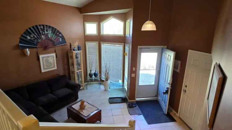 Arbour Lake 4-Bedroom Home - Double Garage & Walkout Basement