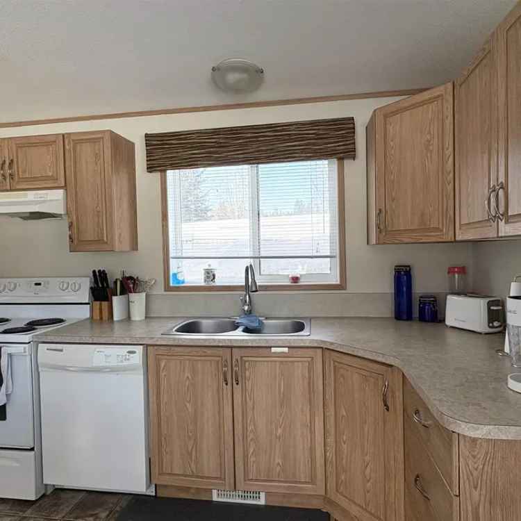 Buy Manufactured Home for Sale Overlooking Serene Creek and Countryside