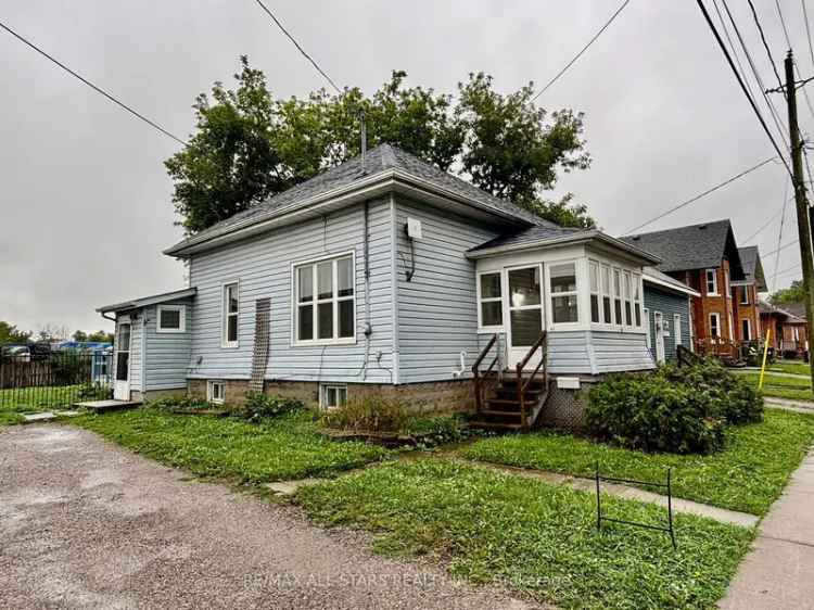 Buy Charming Bungalow in Downtown with Spacious Parking and Deck