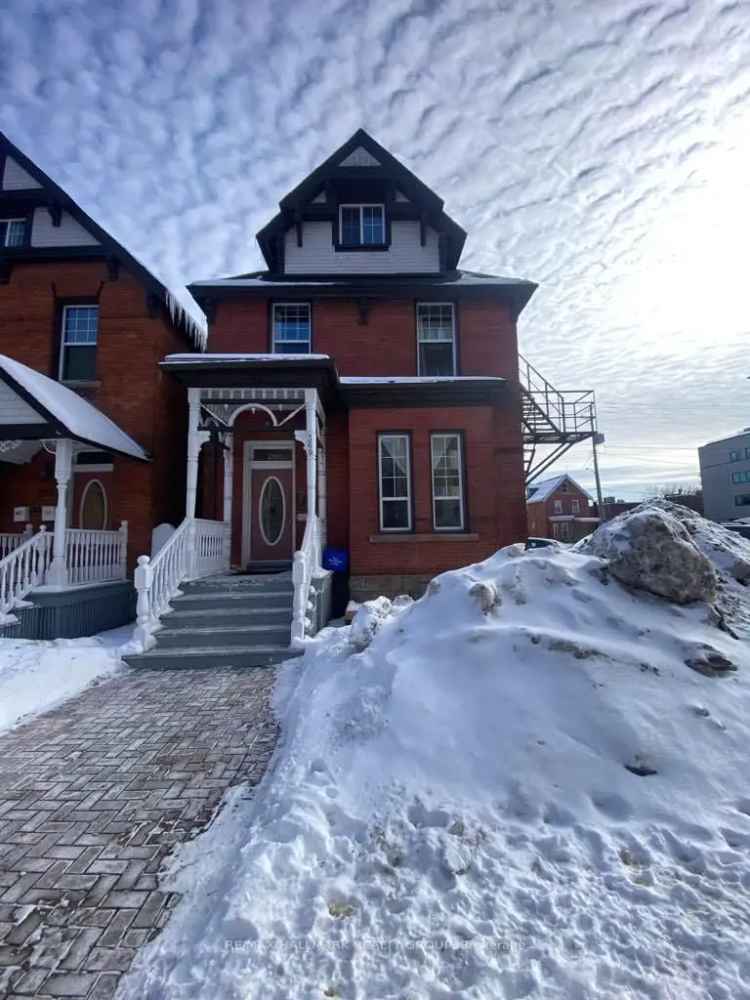 360 Gilmour Duplex: Two Units, Nine Parking Spaces, Recent Renovations