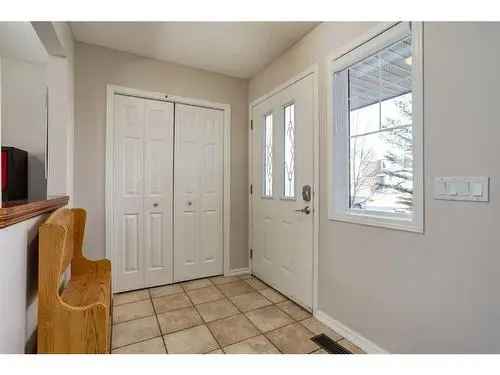 House For Sale in Cougar Ridge Calgary