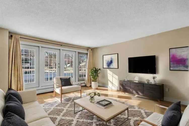 Sunalta Condo: 2 Bed 1 Bath with In-Suite Laundry and Parking