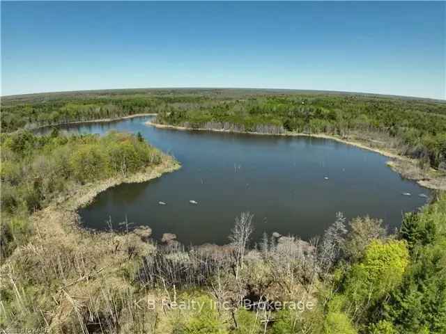 Secluded Lakefront Property Near 401: 25+ Acres of Natural Beauty