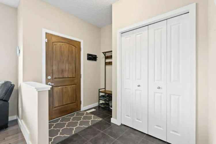 Buy Townhome in Cochrane with 4 Bedrooms and No Condo Fees