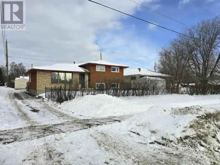 4 Bedroom Brick Home with Double Garage Near Park and School