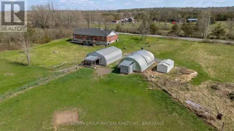 Stunning 28-Acre Property w
In-Law Suite & Barn