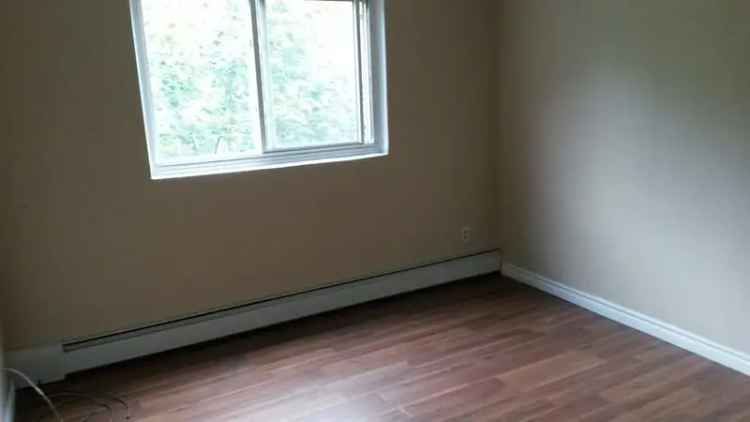 Rent Walk-Up Building in Sarnia with Laundry and Free Parking