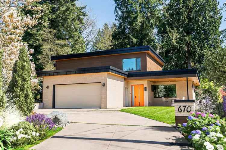 Modern Steel Home with Forest Views