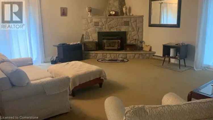 Lakeside 4-Acre Property with 3-Bedroom Home and Detached Garage