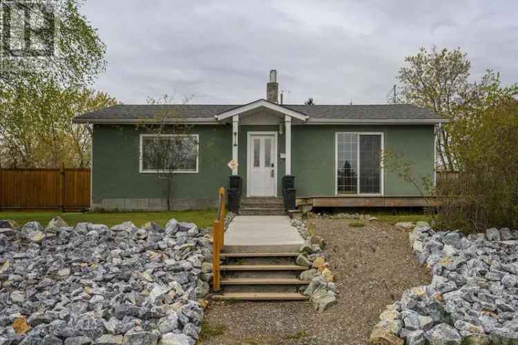 2 Bedroom Rancher on 3 City Lots with Shop Potential