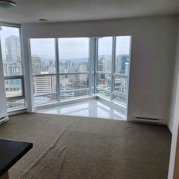 Spacious 1-Bedroom Condo with Den and Solarium for Sale