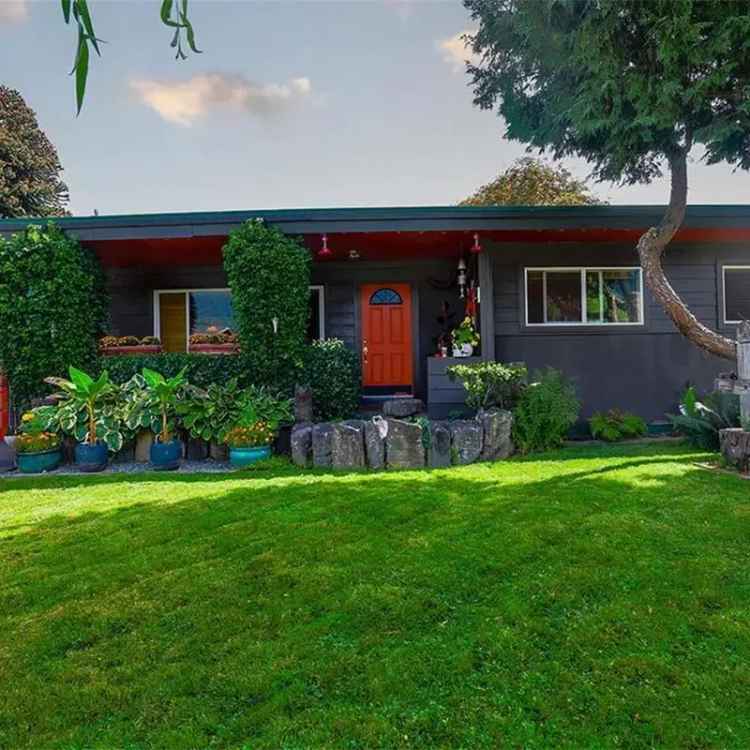 Buy house in Garibaldi Estates with charming gardens and a river rock fireplace