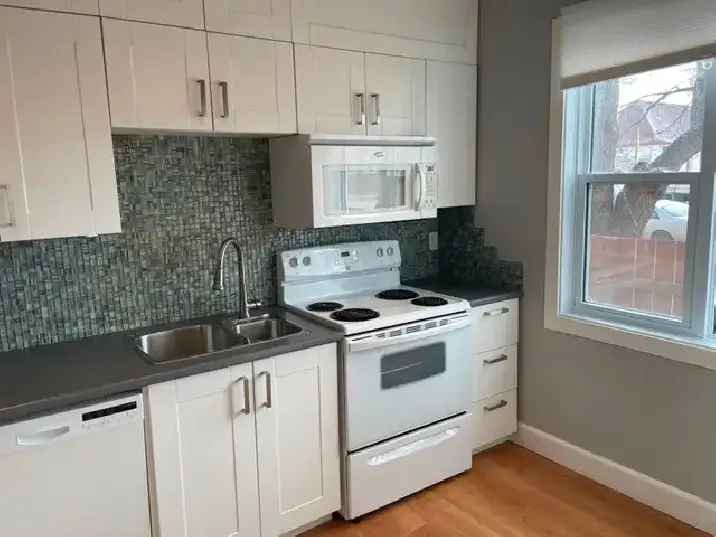 Rent 2 Bedroom Duplex in Winnipeg with Garage and Beautiful Yard