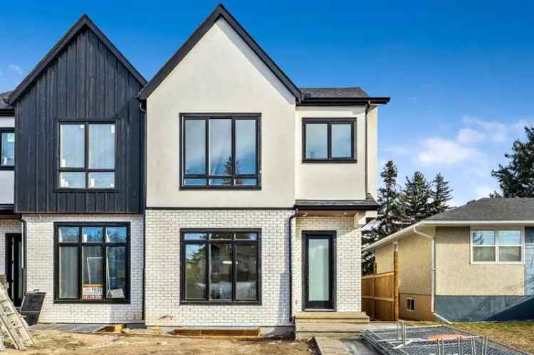 Luxury Banff Trail Infill with Legal Suite & Heated Garage