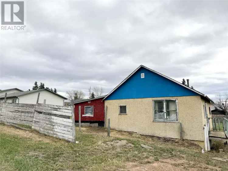 REMAX Dawson Creek Realty Diamond in the Rough Redevelopment Opportunity