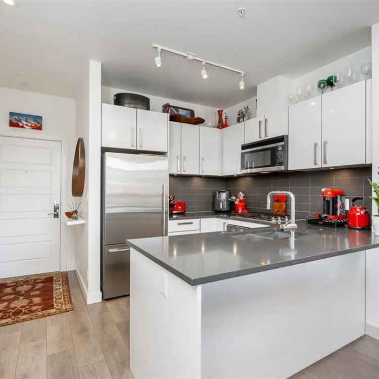 Lower Lonsdale 2 Bed 2 Bath Apartment with Den and Parking