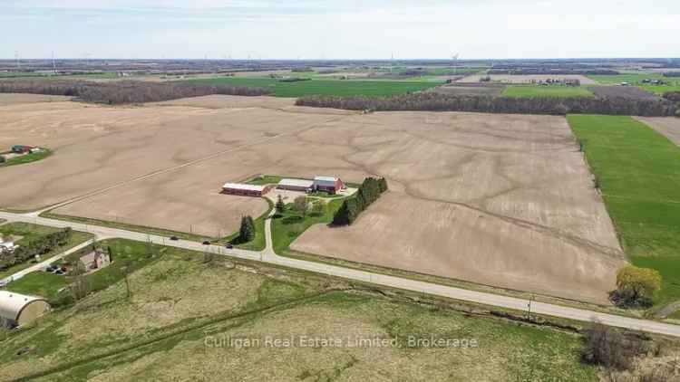 100 Acre Farm with Renovated Brick Home and Versatile Barn Complex