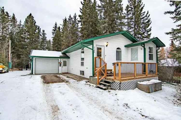 Family Home in Caroline Alberta with 4 3 Renovated Kitchen and Garages