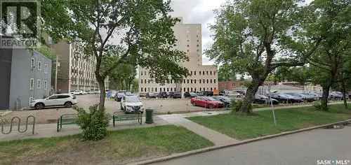 Downtown Saskatoon Investment Property: Parking Lot 5-Unit Apartment Building