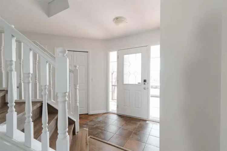 6 Bedroom Eagle Ridge Home with Finished Suite & Double Garage