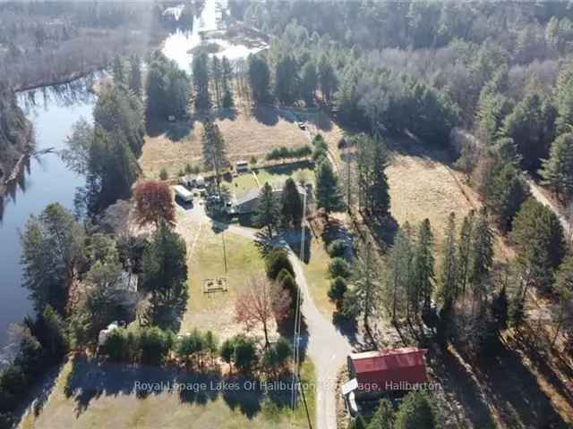 10-Acre Riverfront Property with Barn - Burnt River