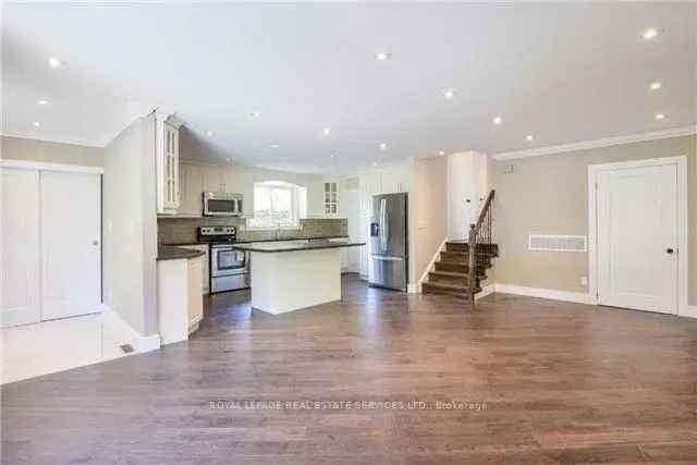 Impressive Open Concept Renovated 3-Level Backsplit in Applewood