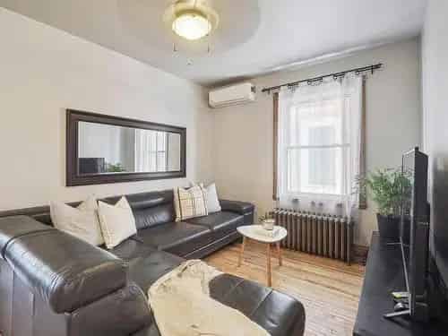 Verdun Duplex: 5-Bedroom Family Home with Rental Income