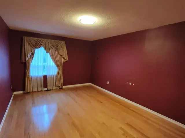 Bright 4-Bedroom Home Near Schools and 401