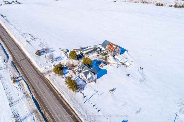 97 Acre Farm with Renovated Farmhouse and Outbuildings