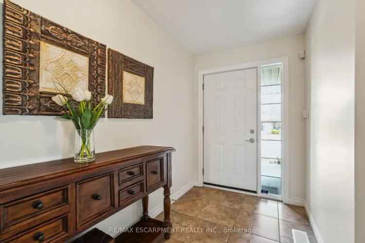 4-Bedroom Family Home with Main Floor Primary Suite and Private Backyard