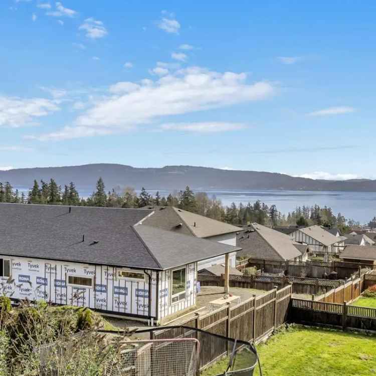 5 Bedroom 3 Bathroom Ocean View Home with Legal Suite