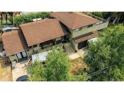 Buy House in Glenmore Clifton Dilworth Kelowna with Development Potential