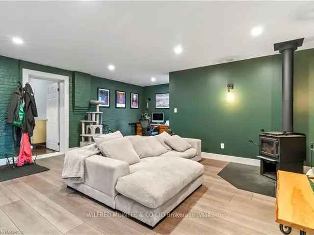 Charming Updated 1.5-Storey Home with 788 Sq Ft Addition