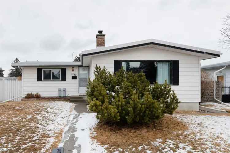 Buy beautiful renovated mid century home with legal suite in North Calgary