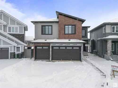 House for Sale in Downtown Edmonton with Modern Features and Green Space