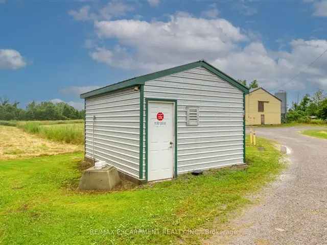 18.97 Acre Poultry Farm with 3 Barns and Bungalow