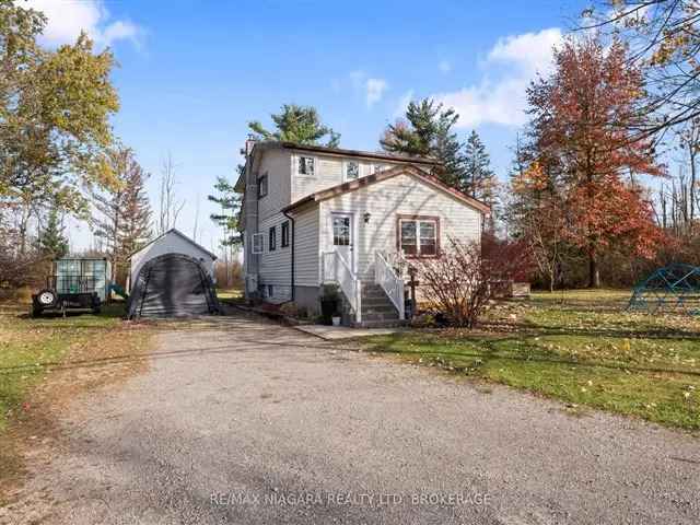 Beautifully Renovated 1.5-Story Home on 5.8 Acres