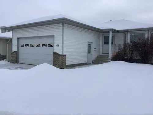 Bungalow For Sale in Kentwood East Red Deer with 4 Bedrooms and Enclosed Deck